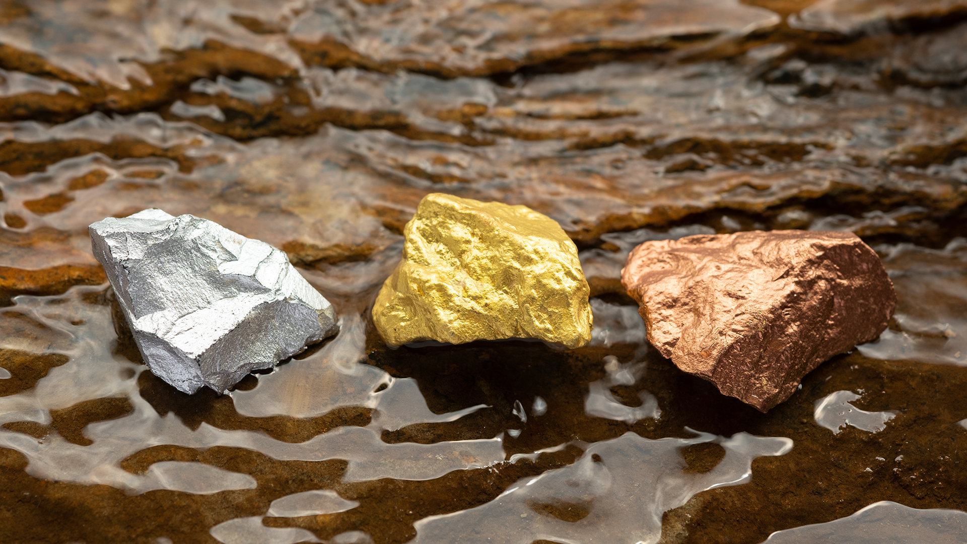 Different types of precious metals - gold, silver, copper.