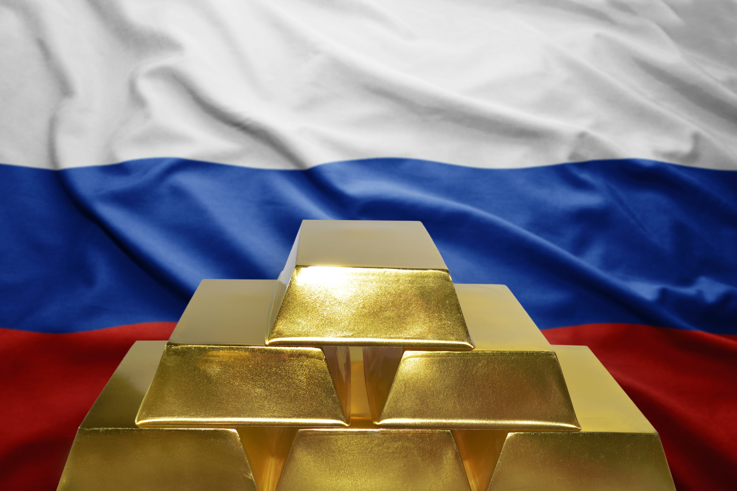 Shining Golden Bullions On The Russian Flag Background