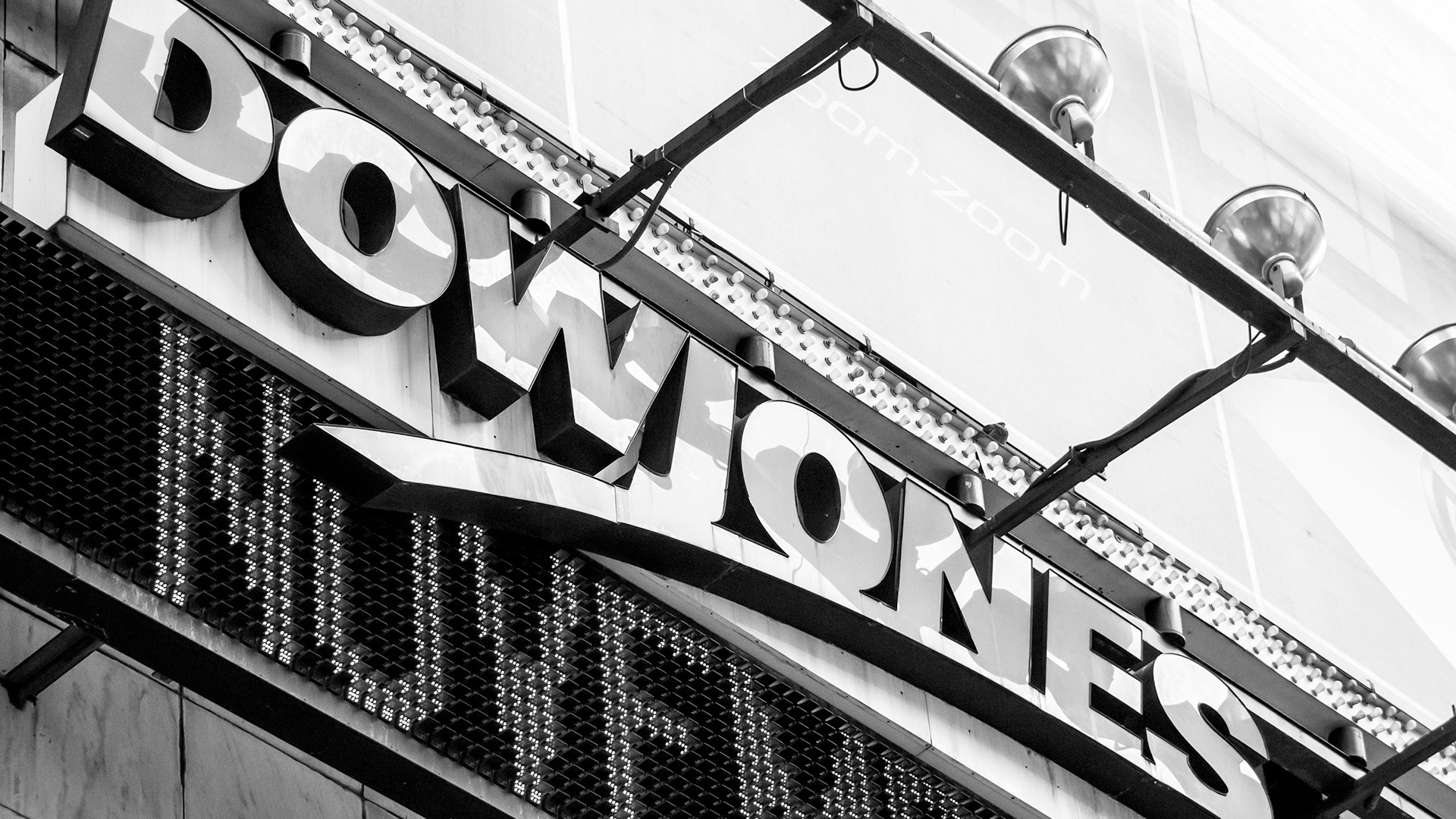 Dow Jones building signage amid Stock Decline, and the Dow Jones Loses This Year's Gains